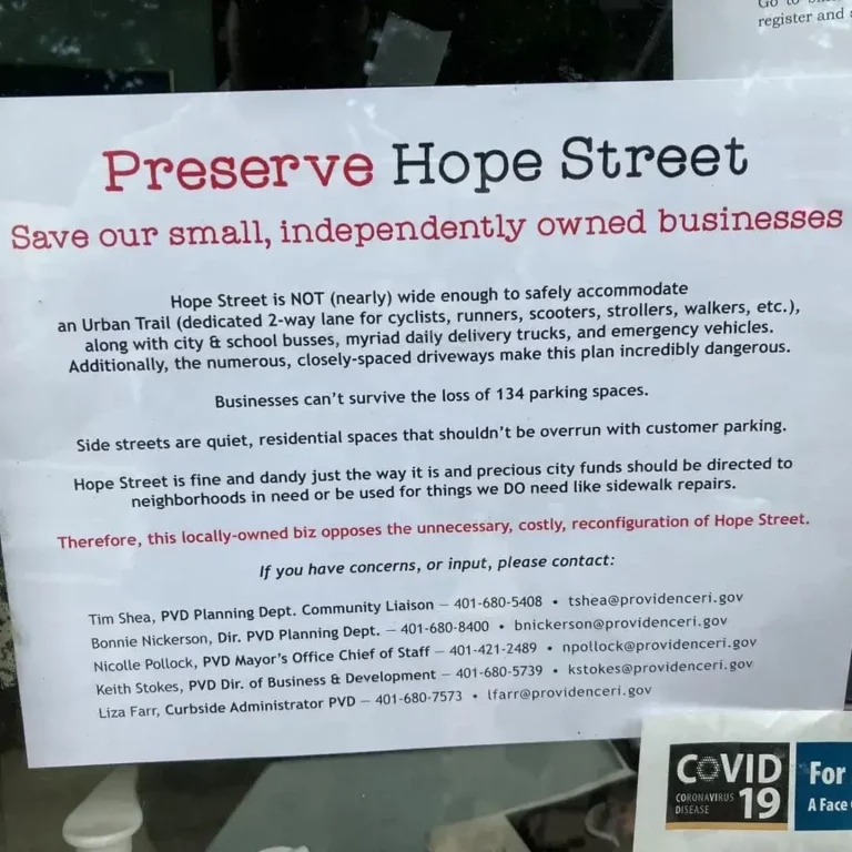 Letter posted on business windows about the bad effects from the bike lane.