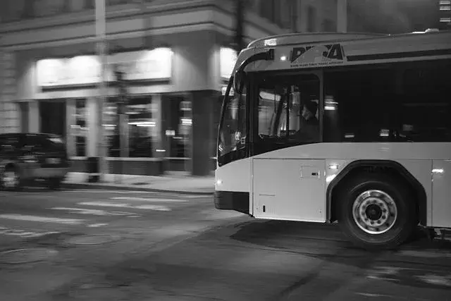 RIPTA bus driving down the street.