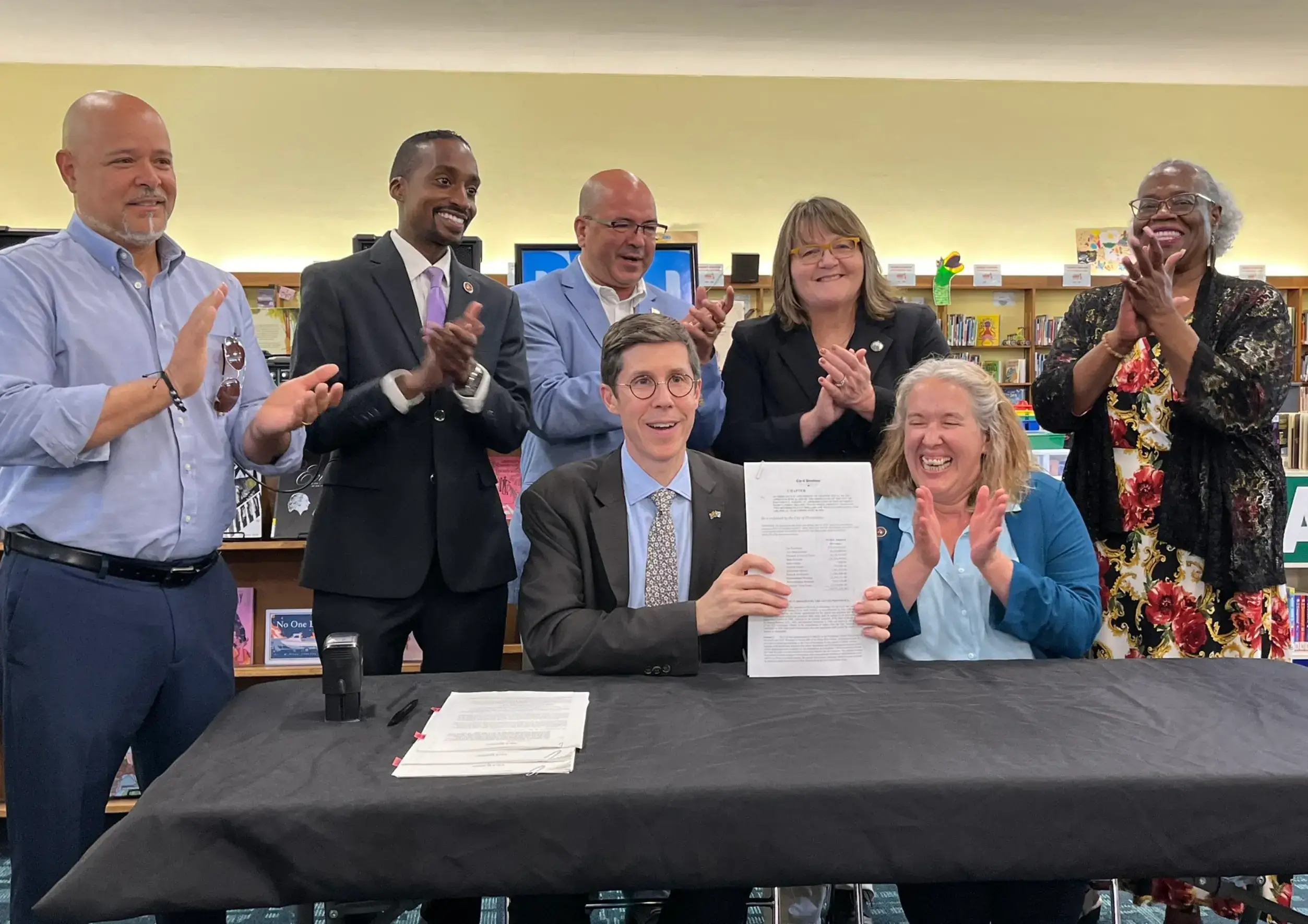 Providence City Council poses with Smiley over 2025 budget.